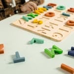 Colorful wooden alphabet letters for preschool children's learning and creativity.